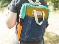 Multicolored waxed canvas backpack